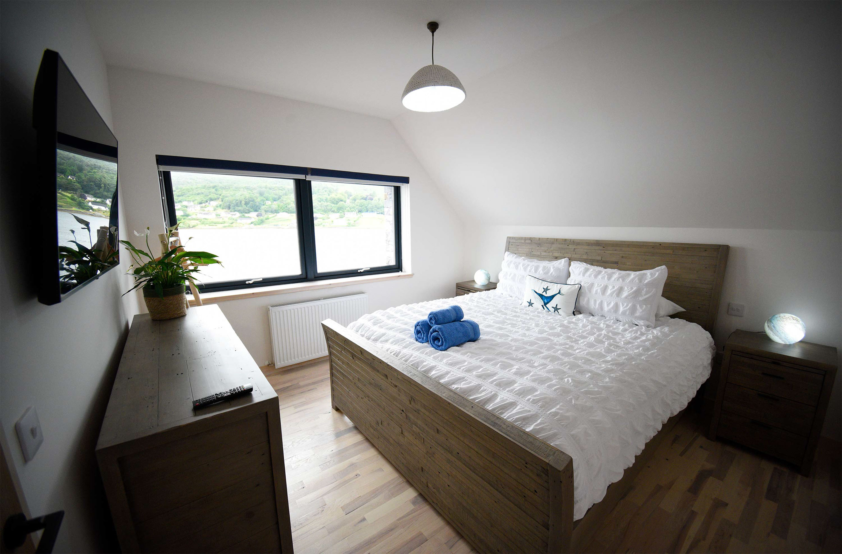 Enjoy a great nights sleep at Stay in Portree Bay Super King size beds looking on to amazing sea views