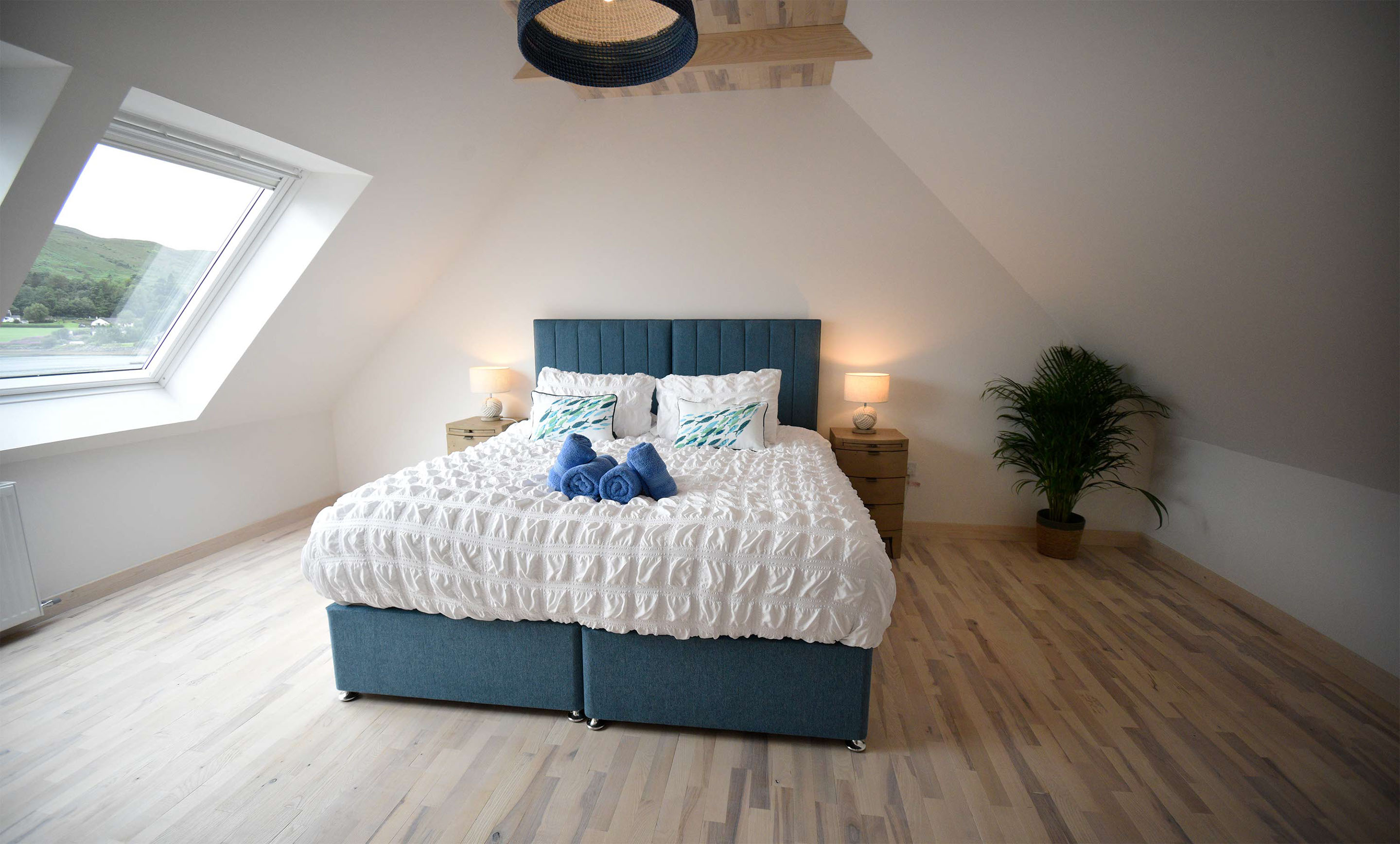 Fisherman's Cottage luxury self catering accommodation in Portree contains Super King size double beds with sea views