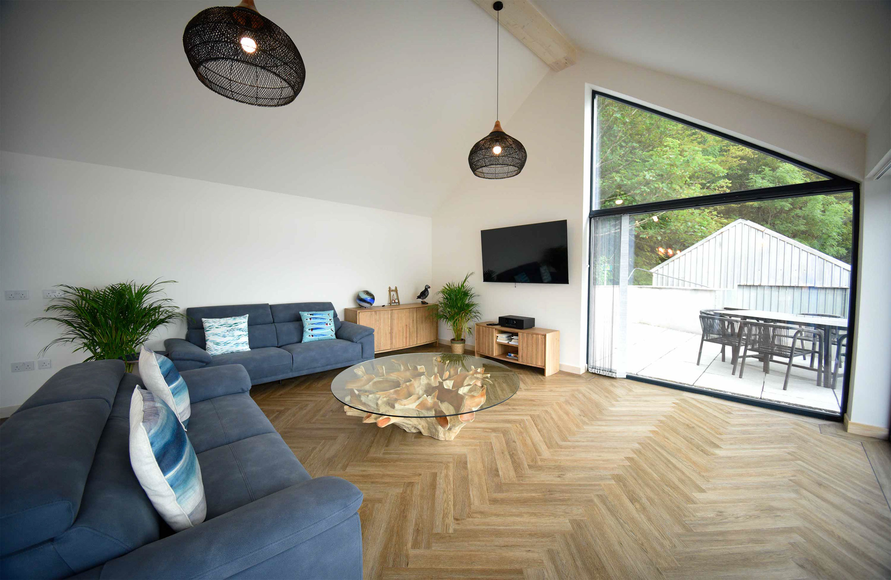 Slignich House luxury self catering accommodation in Portree contains a spacious living room with sea views 