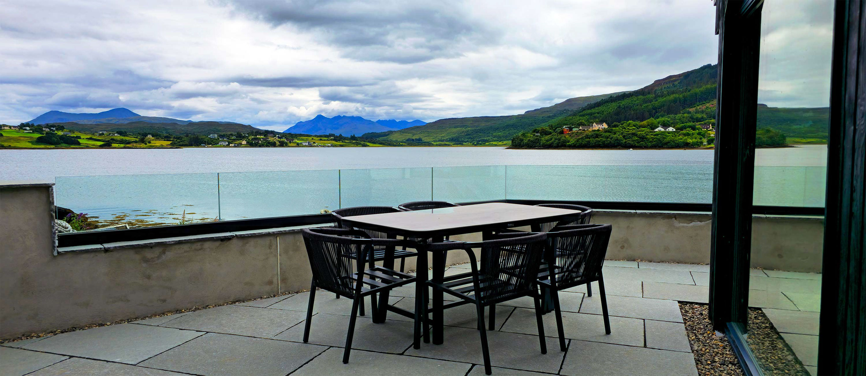 Slignich House features an outside seating area looking on to spectacular sea views and the Cuillin Mountains